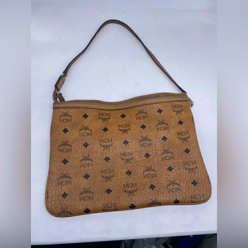 MCM authentic Cognac visetos zip Pouch entrupy COA